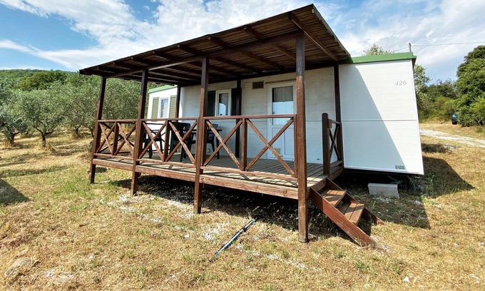 Capraia e Limite Casa | Hermoso bungalow con piscina compartida