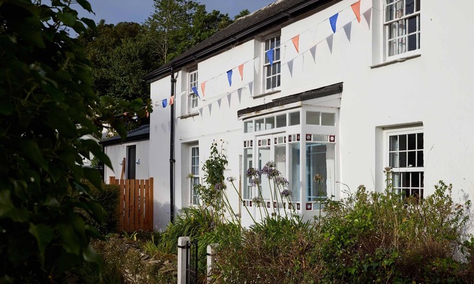 Helford Cabaña | Cabaña mágica con vistas al mar, un jardín apartado y acceso a la playa.