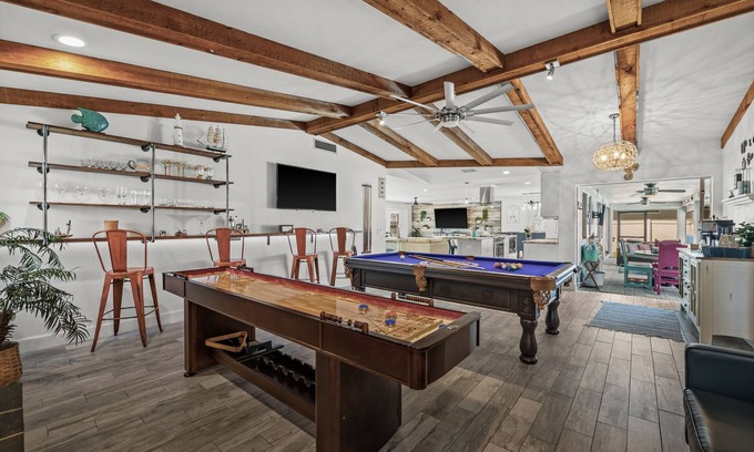 Caloosahatchee Casa | Beautiful Dog Friendly Home with Screened-in Heated Pool, Game Room/Bar