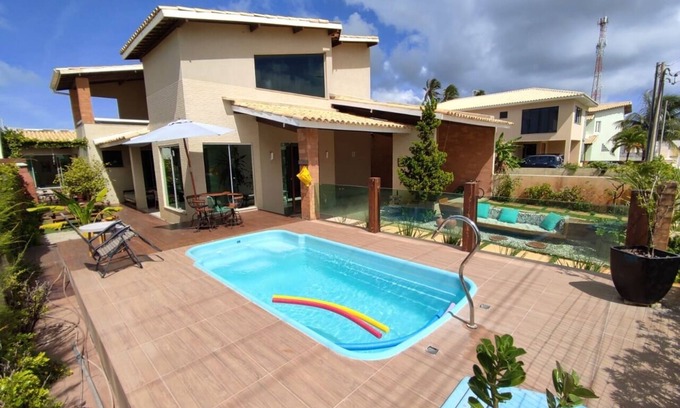 Mosqueiro Casa | Beautiful furnished 5-suite beach house with swimming pool in gated sea front community.