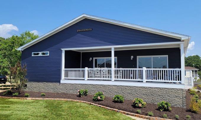 Long Neck Casa | Beautiful home - marina, beach, pools, family fun, pets!