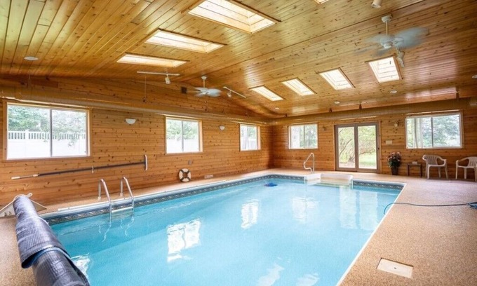Rib Mountain Casa | Beautiful home on the Lake. Indoor Pool. Private Pier and a mile from Ski Hill