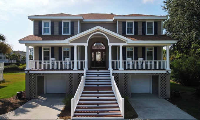 Ocean Point Casa | Beautiful home with open porches overlooking lagoon in Wild Dunes