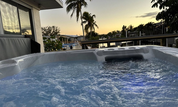 Lochmoor Waterway Estates Casa | Beautiful North Fort Myers Home w/ Hot Tub & Boat Lift