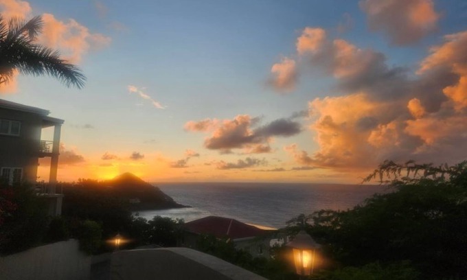 Great Cruz Bay Condominio | Beautiful ocean views throughout. Conveniently located near town. Large porch!
