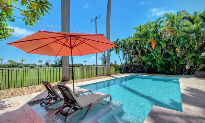Parrot Cove Casa | Beautiful Pool home on Golf Course, with Intracoastal views, 1 mile to the Beach