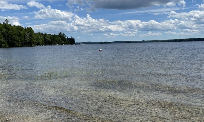 Ellsworth Casa | Beautiful private beach area within steps from the modern updated log home