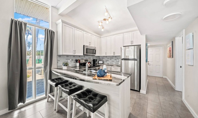 Orlando Beach Condominio | Beautiful Riverfront Villa W/ Private Beach Access, Fire Pit, & BBQ Grills