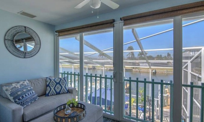 Saint James City Condominio | Beautiful SJC Island Condo w/heated pool on main canal, great fishing!