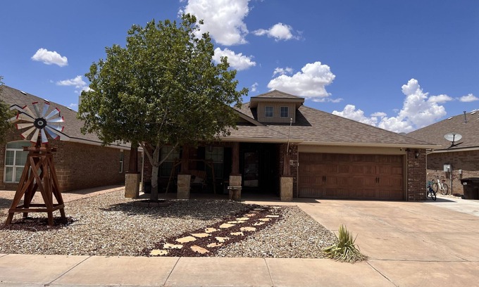 Midland Casa | Beautiful three bedroom home with a gym and huge TV’s! Pet and smoke free home!