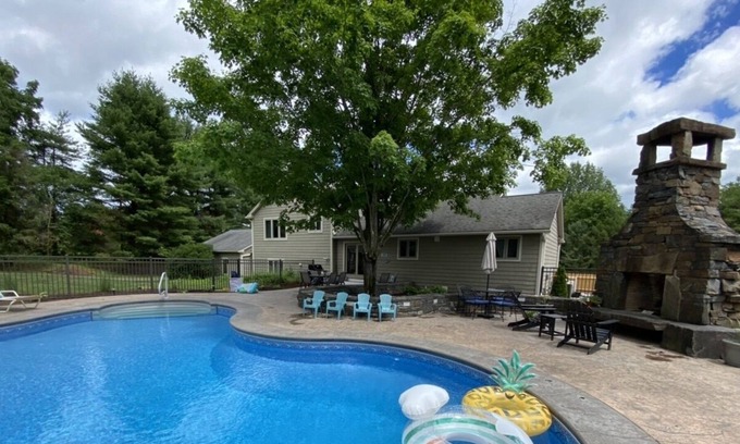 Queensbury Casa | Beautiful vacation home with gorgeous mountain pool with great outdoor space!