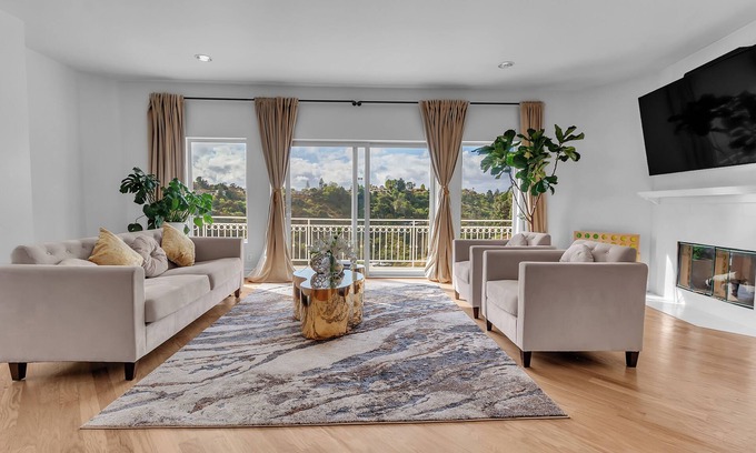 Bel Air Casa | Bel Air Tennis Villa offers serene canyon views and glimpses of the ocean.