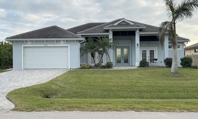 South Gulf Cove Casa | Bela-Vita-Charming 3-bedroom canal front pool home with 2 master suites
