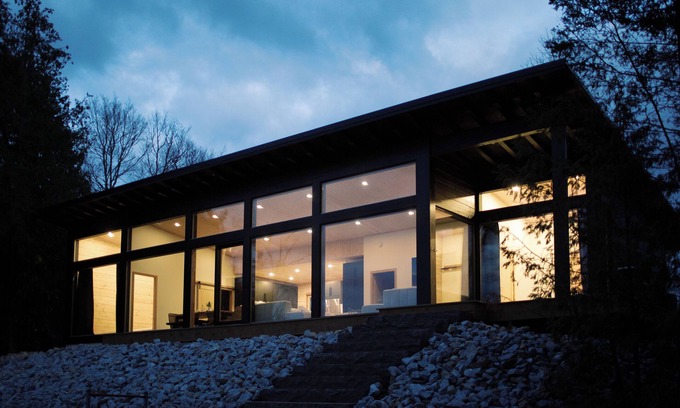 North Frontenac Cabaña | Bellevue: A cozy, Scandinavian-style cottage nestled on a hill.
