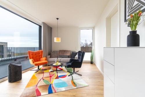 Marienleuchte Apartamento | BeltBlick 18 – Ostseeleuchten - Moderne Ferienwohnung mit Dachterrasse direkt an der Ostsee!