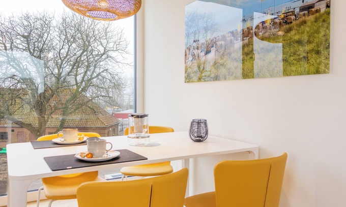 Marienleuchte Apartamento | BeltBlick 30 - roof terrace. Sauna. Sea view. Family-friendly.