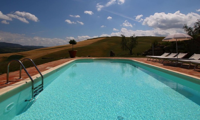 Castel del Piano Apartamento | Acogedora casa de campo en Castel del Piano con piscina