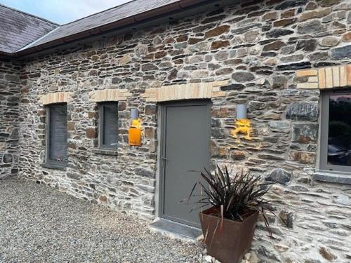 Carmarthen Casa | Beudy at Pentrecelyn - a gorgeous barn conversion with hot tub