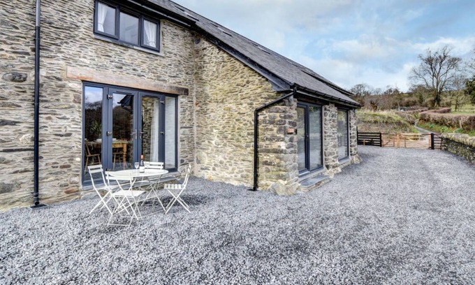 Machynlleth Casa | La escapada ideal para parejas y familias pequeñas. Beudy Tanllan casa ha sido brillantemente renova