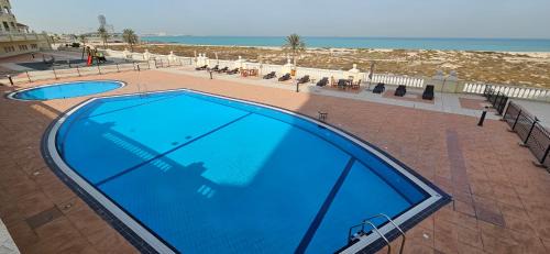 Al Hamra Village Apartamento | Big 2br Apartment close to the sea and Golf course