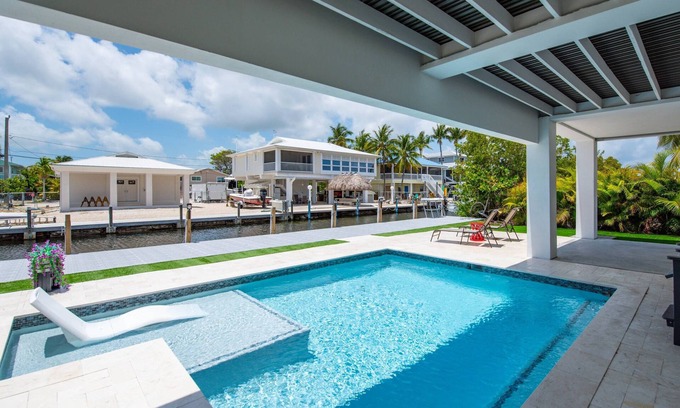 Doctor's Arm Casa | Big Pine Paradise: Beautiful Updated 4BR Canal Front Home, Pool, Dockage, Easy Gulf/Atlantic Access