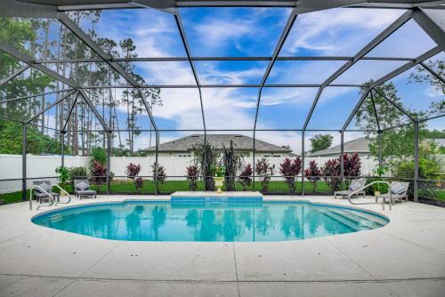 Palm Coast Casa | Bike, Golf and Swim Palm Coast Home with Lanai!