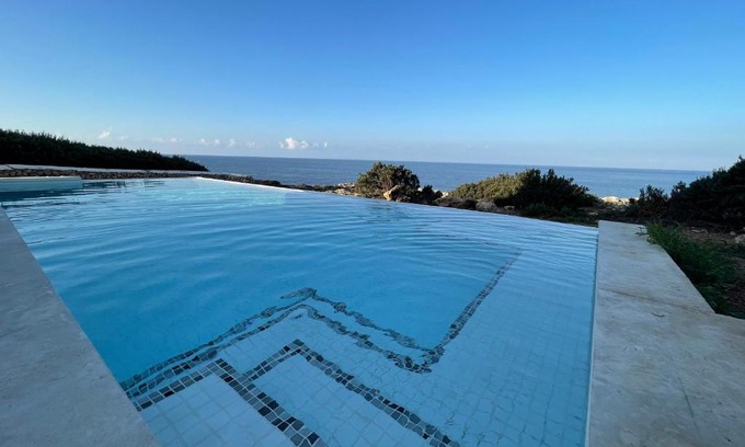 Binibeca Apartamento | Binisamar Infinity Pool over the sea