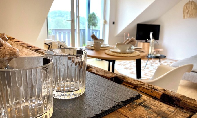 Losheim am See Apartamento | BioLoft by the lake and distant views. Cozy vacation apartment on the top floor