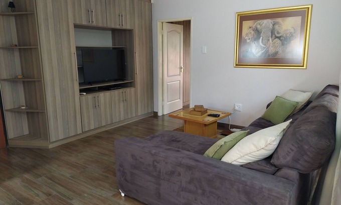Vanderbijlpark Apartamento | BLESSING furnished apartment, fully equipped kitchen, bathroom, lounge, bedroom.