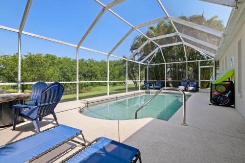 Sabal Harbour Casa | Blue Heron House! Cozy home with heated pool and pool toys! Water view out back!