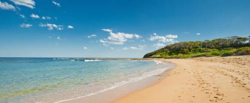 Bateau Bay Complejo | Blue Lagoon Beach Resort