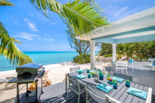 East End Casa | Blue Moon - A Divers Paradise in East End Next Door to Ocean Frontiers, Beach Cottage with Upgraded Interiors