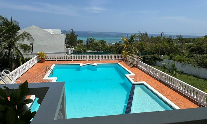 IronShore Estates Villa | Blue Turquoise Sea Villa