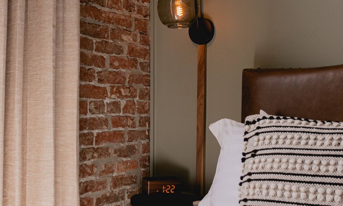 Jacksonville Hotel | Boutique 1 BR King Guest Room in historic Jacksonville, OR. Features a plush King bed, Nespresso machine, and charming Inn details. Perfect for a comfortable, walkable downtown escape.