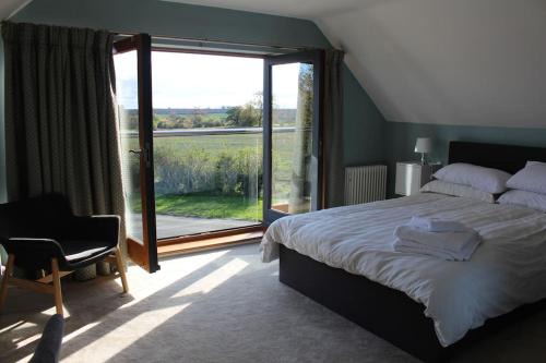 Wilby Apartamento | Boutique double room with country village views