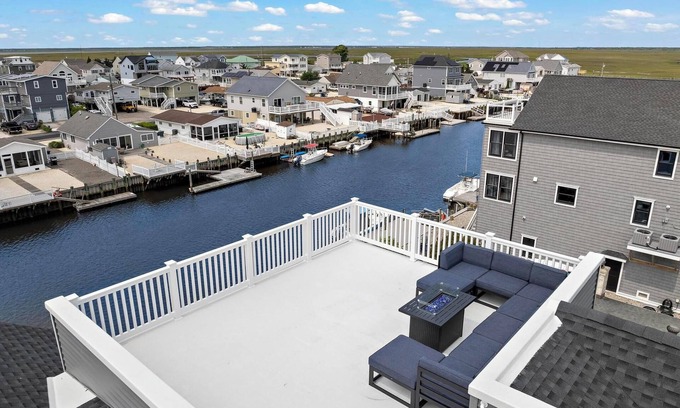 Mystic Island Casa | Brand New, Waterfront Beach Oasis with Heated Pool, Hot Tub, & Dock close to LBI