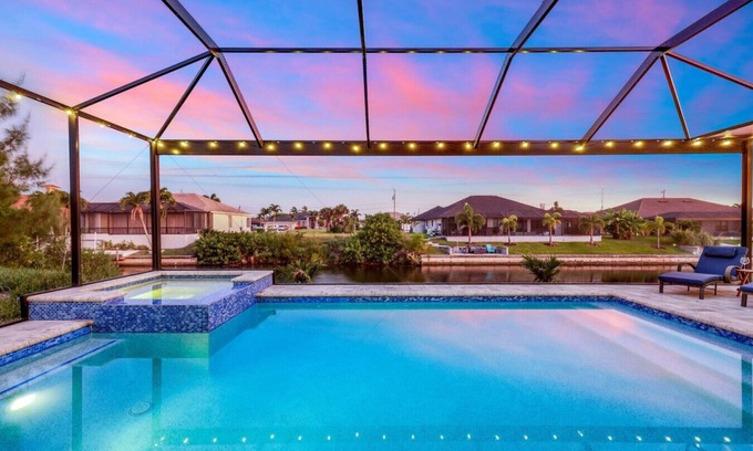 Pelican Casa | BRAND NEW- Gulf access electric heated pool home sleeps up to 13 guests