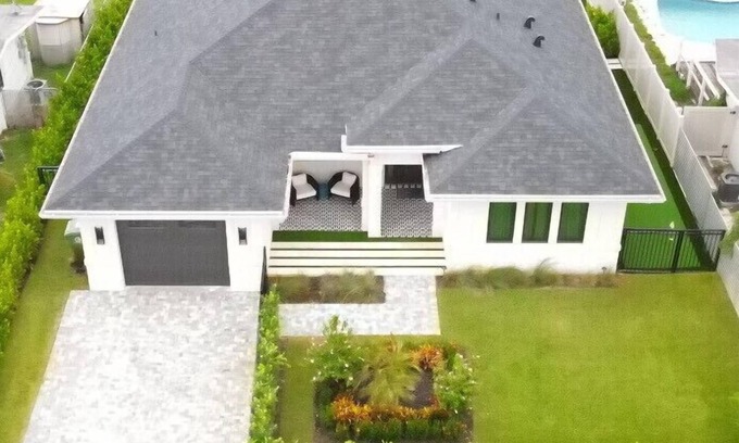 Lauderdale Isles Casa | Brand New Luxury Tropical Villa with Pool, Dock & Minutes to Hard Rock + Beach + FLL + Downtown Ft Lauderdale