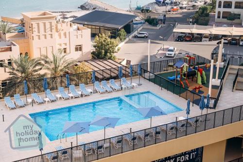 Al Hamra Village Apartamento | Brand New Studio Canal View