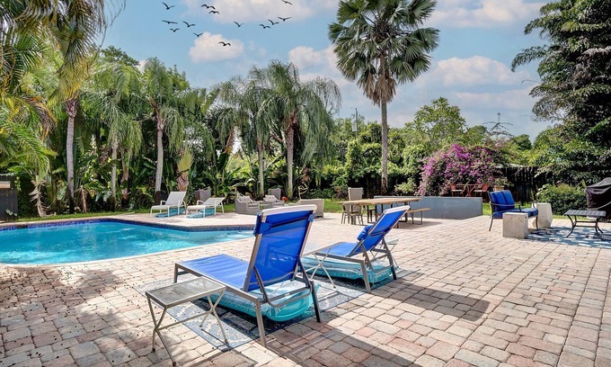South Middle River Casa | Breathtaking Pool Home and Backyard by Wilton Mnrs