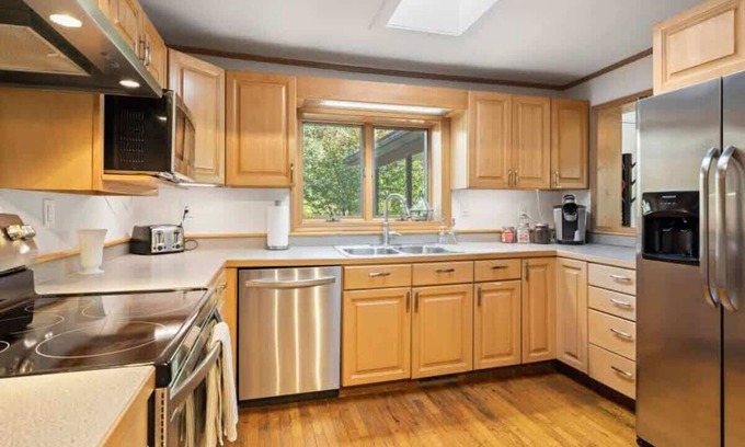 Hendersonville Casa | Bright 2BR House w/ Sunroom + Firepit~Near Trails
