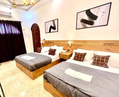 Gulshan-E-Jamal Cama Y Desayuno | Budget Friendly 2 rooms Suite Stadium Road