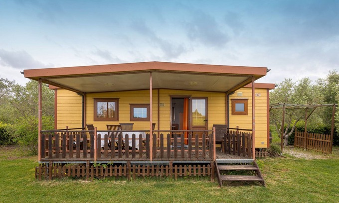 Bibbona Casa | Bungalow 'Stella 1' con piscina compartida, terraza privada y aire acondicionado
