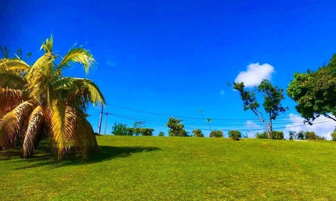 Bouillante Casa | Bungalows con piscina con impresionantes vistas al mar y montaña para 4 personas cada uno.