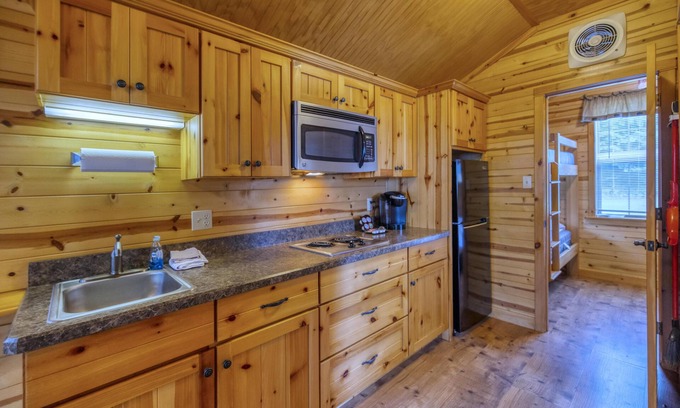 Dickerson Run Cabina | Cabin 10 - The beautiful pine tongue groove interior will not disappoint even the most meticulous.