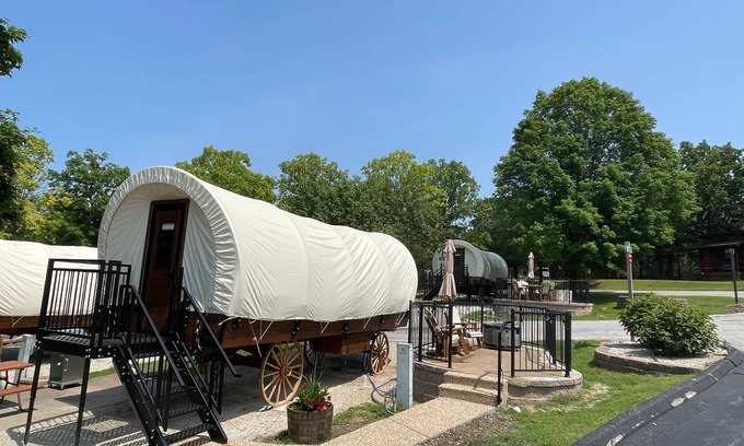 Branson Cabaña | California Trail Wagon includes 1 king bed, bathroom w/ shower, heat & a/c, smart tv, wi-fi, microwa