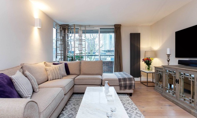 Belsize Apartamento | Brillante y contemporáneo 2BR en el frondoso parque Belsize, por Veeve