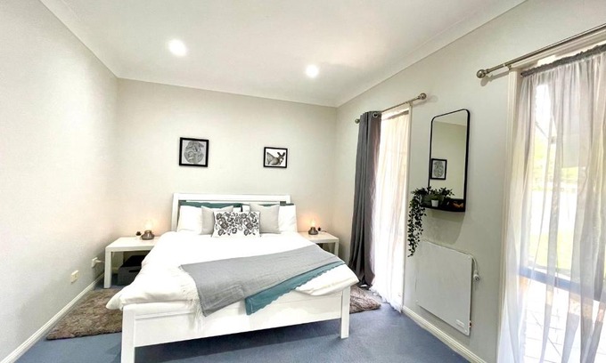 Jimboomba Casa | Camelot - Homestay - Double Room, private bathroom and private kitchenette on ground floor of our home