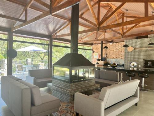 Delfim Moreira Casa | Campo Florido