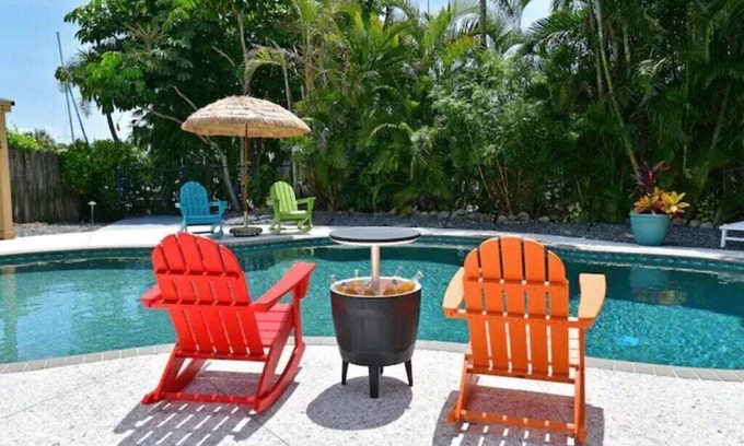 Bayshore Gardens Casa | CANAL FRONT! Bring or rent a boat, near AMI/IMG + HEATED POOL